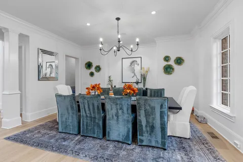 a dining room with furniture and a fireplace