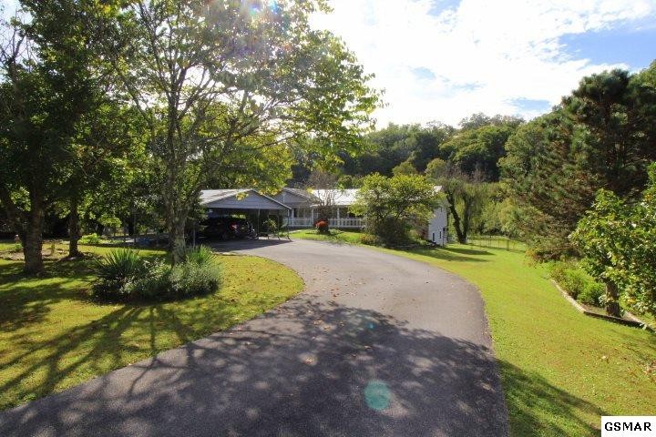 1822 New Era Road Sevierville, TN 37862 - Photo 1 of 34 a view of a park with large trees