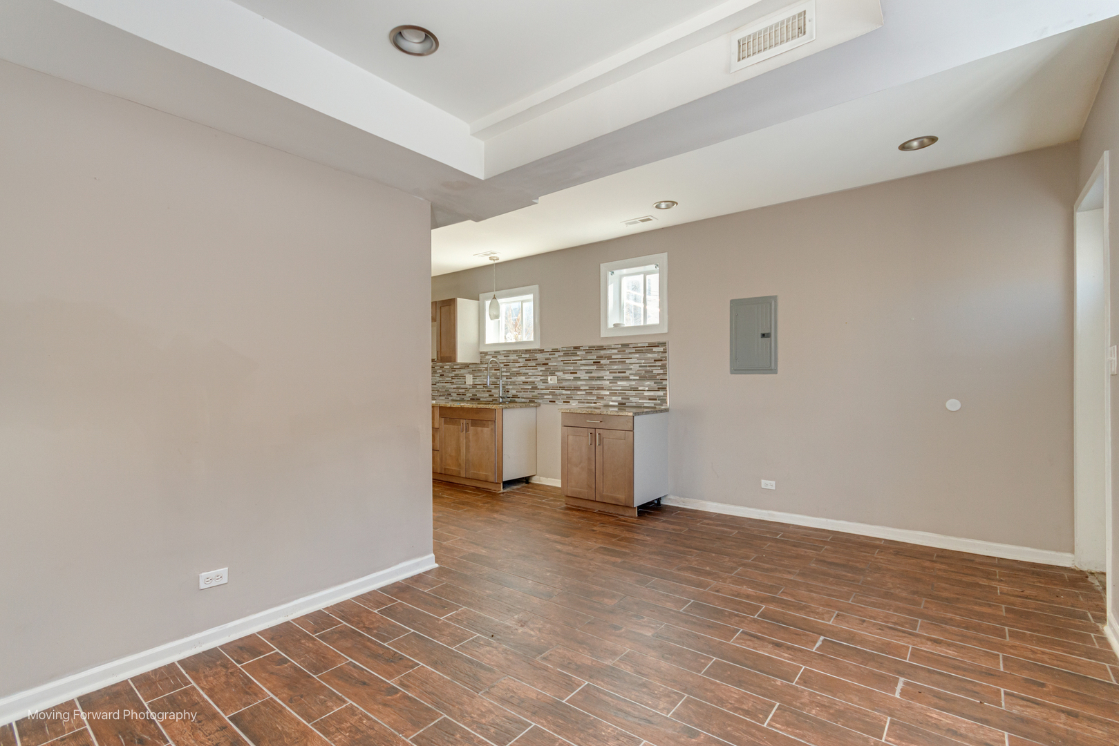 1715 East 70th Street Chicago, IL 60649 - Photo 14 of 29 a view of a kitchen with a sink and a window