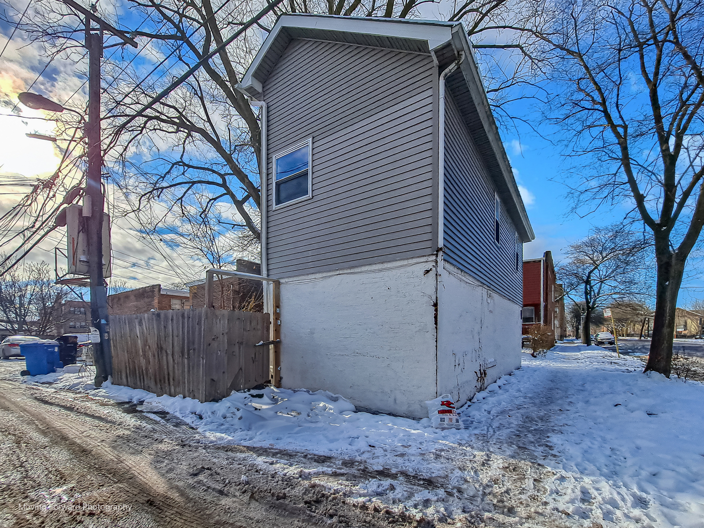 1715 East 70th Street Chicago, IL 60649 - Photo 7 of 29 a view of a backyard with a large tree