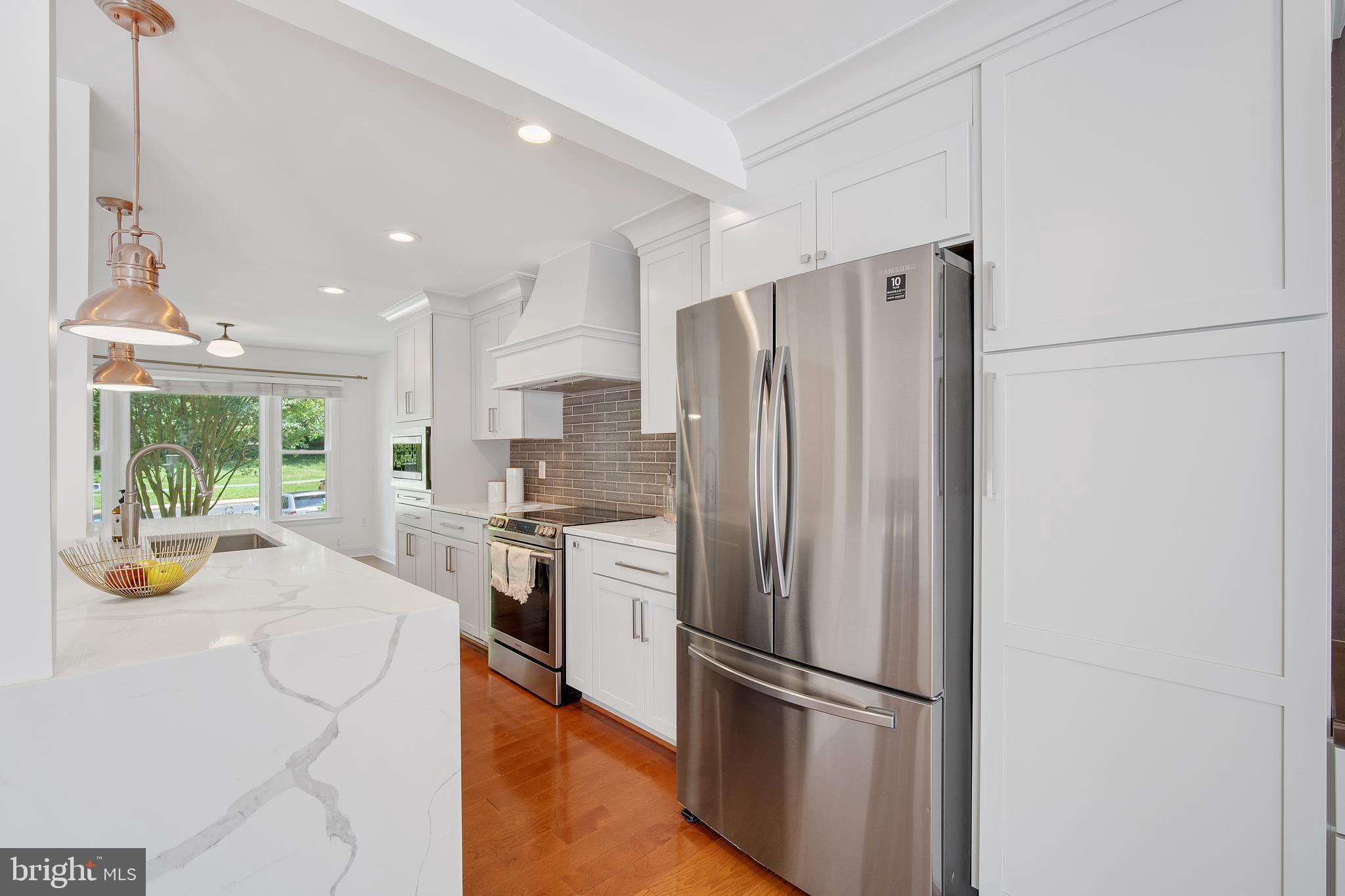 9105 Saffron Lane Silver Spring, MD 20901 - Photo 11 of 43 New stainless steel appliances and industrial vent