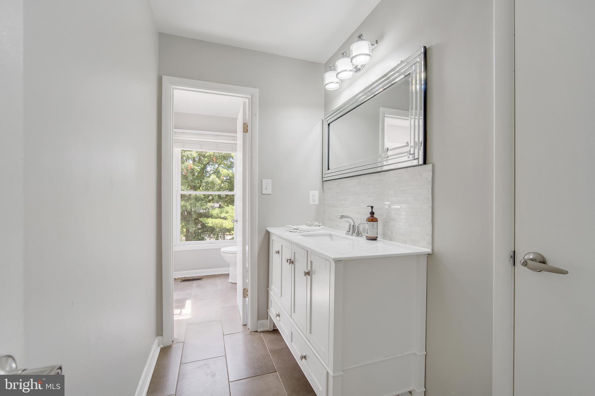 9105 Saffron Lane Silver Spring, MD 20901 - Photo 23 of 43 Remodeled primary bathroom
