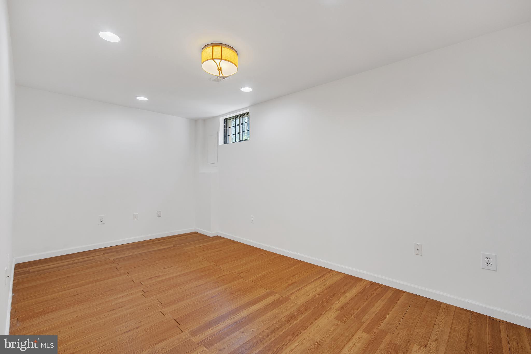 9105 Saffron Lane Silver Spring, MD 20901 - Photo 33 of 43 Finished basement with new flooring