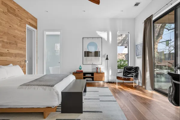 a white bath tub sitting next to a window
