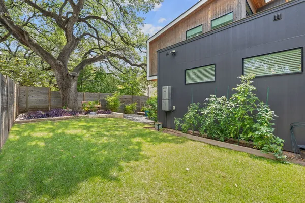 a view of a back yard of the house