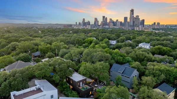 an aerial view of a city with lots of residential buildings