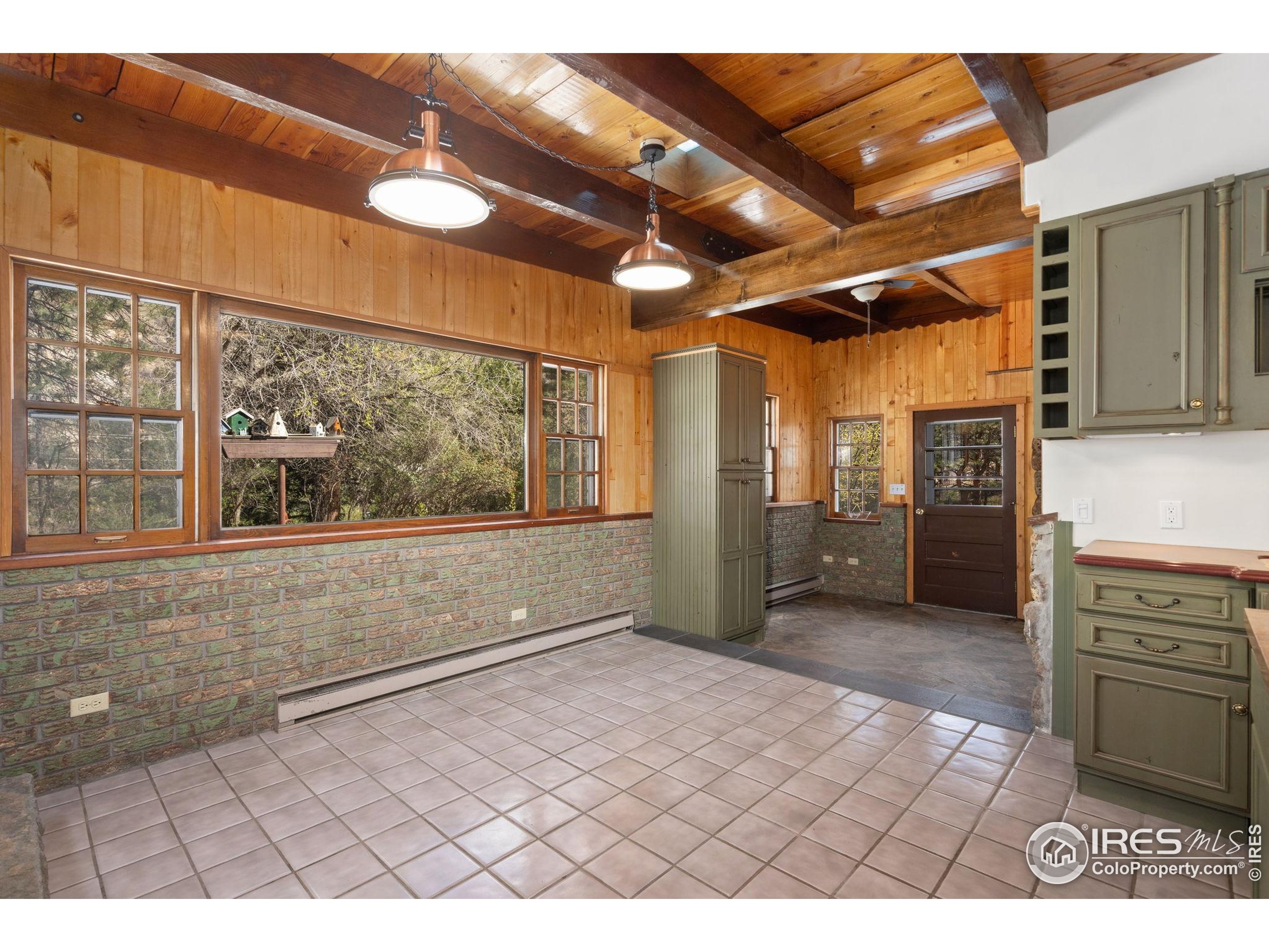 7301 Poudre Canyon Road Bellvue, CO 80512 - Photo 20 of 41 a view of hallway with a large window