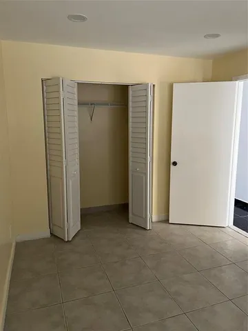 an empty room with closet