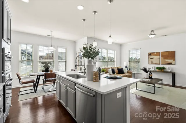 a view of a living room and dining room