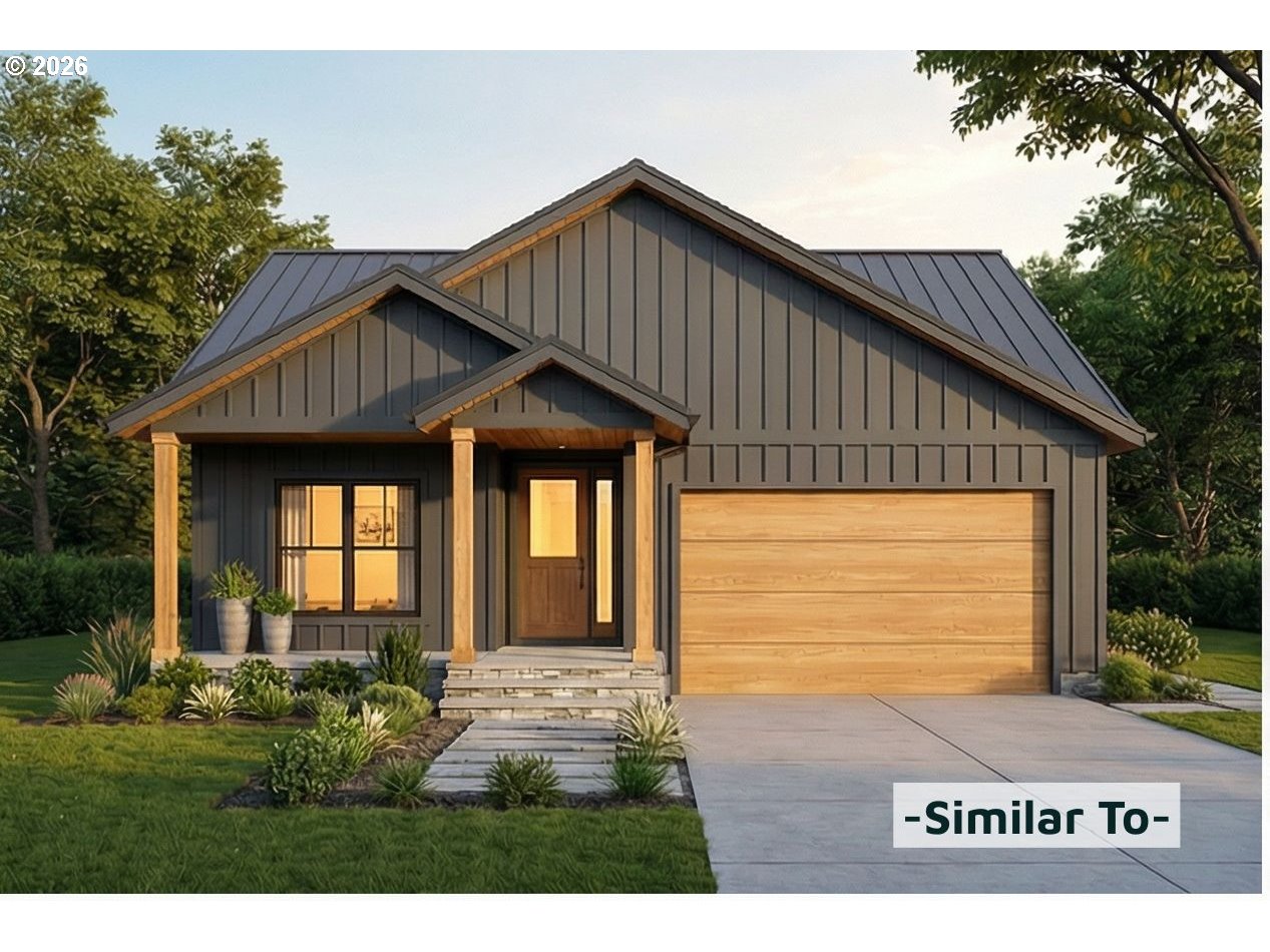 9 Marion Court Mount Angel, OR 97362 - Photo 6 of 11 a front view of a house with a garden