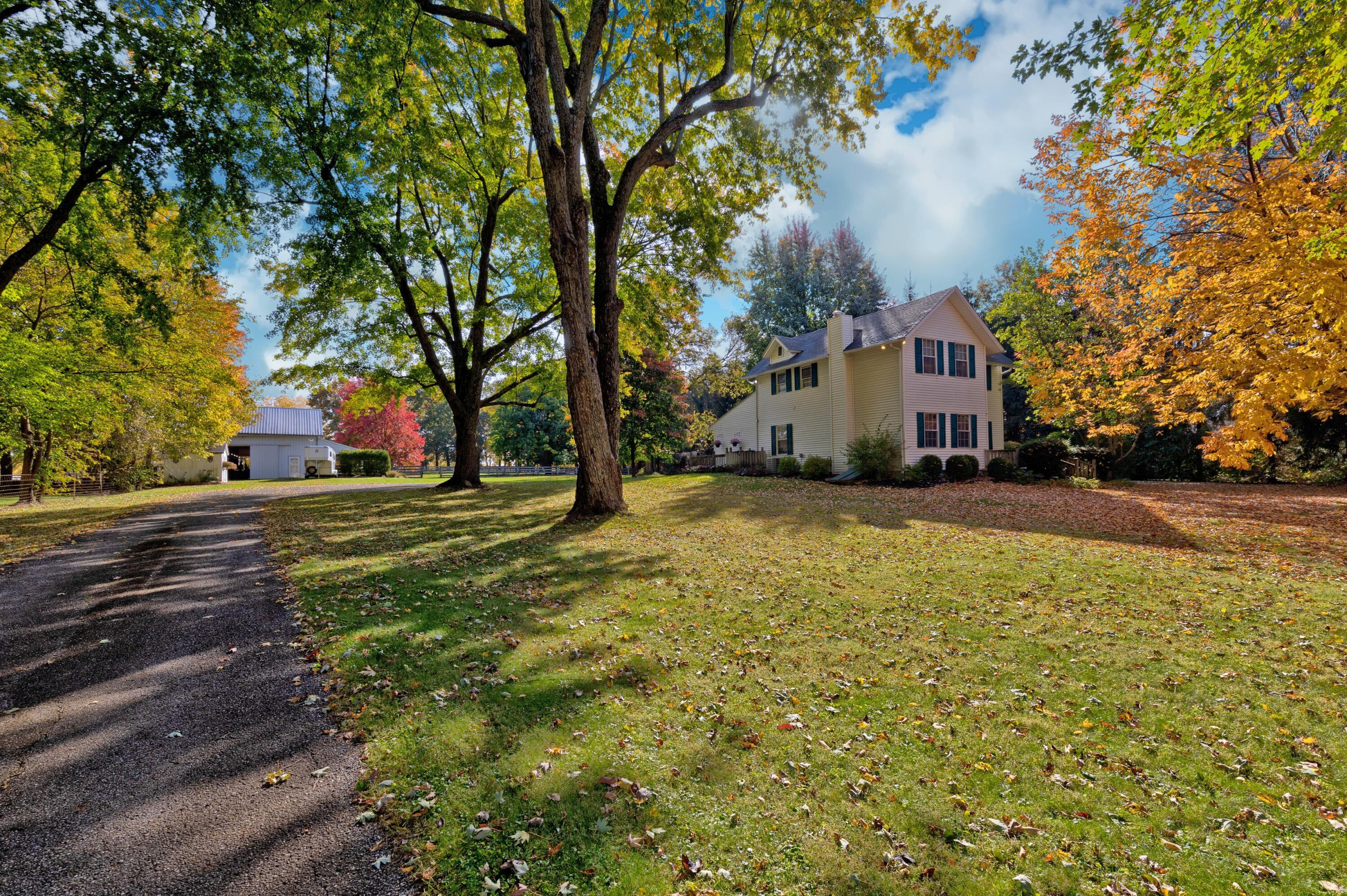 6681 Harlem Road Westerville, OH 43082 - Photo 77 of 78 62. Front View of Home, Yard, & Barns