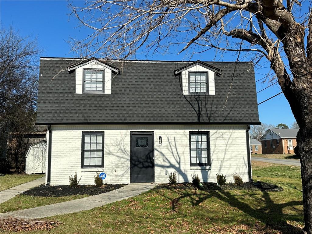 10 Hawk Road Northwest Cartersville, GA 30121 - Photo 1 of 23 a front view of a house with a yard