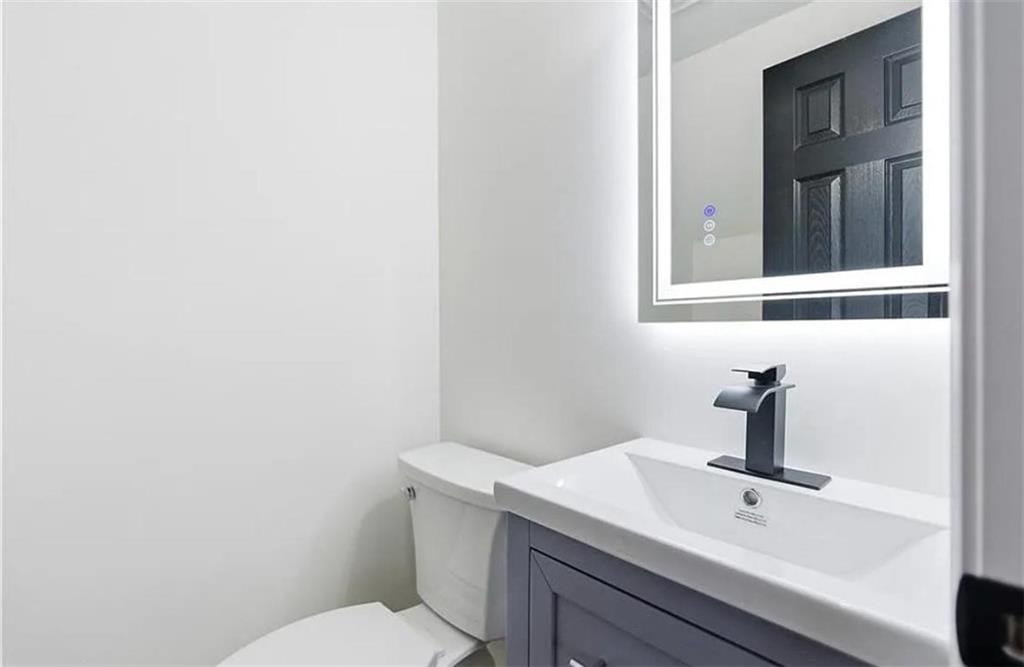 10 Hawk Road Northwest Cartersville, GA 30121 - Photo 11 of 23 a bathroom with a sink and mirror