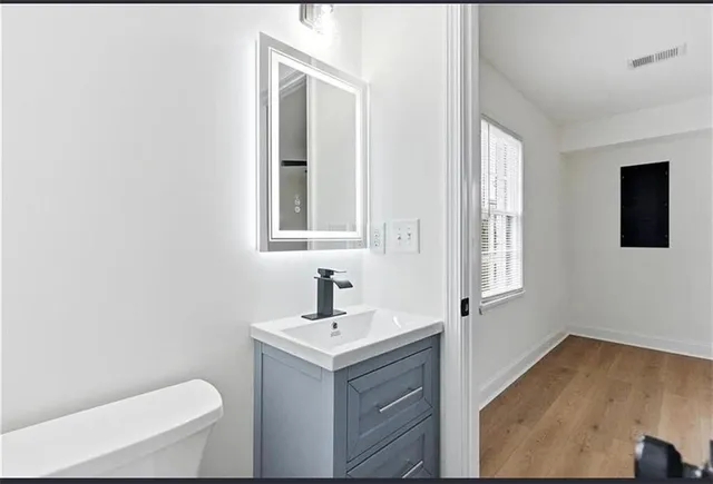 a bathroom with a sink and a toilet