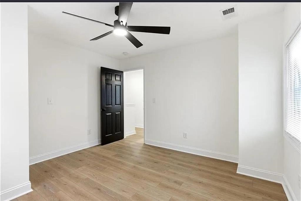10 Hawk Road Northwest Cartersville, GA 30121 - Photo 14 of 23 a view of empty room with wooden floor