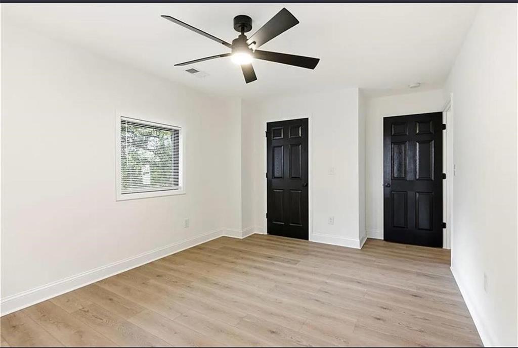 10 Hawk Road Northwest Cartersville, GA 30121 - Photo 17 of 23 a view of an empty room with a window