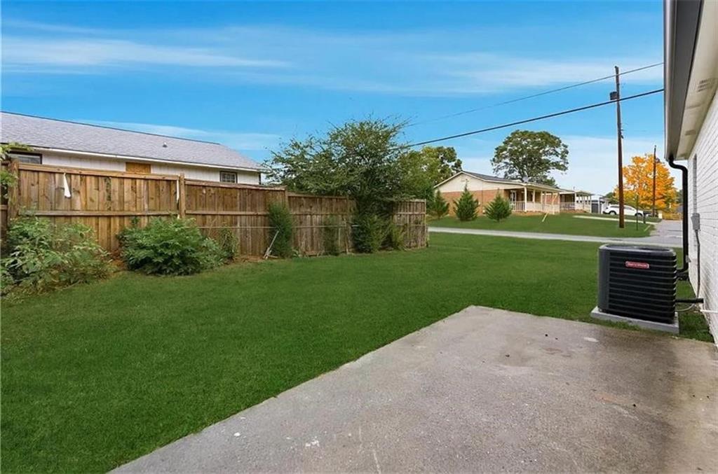 10 Hawk Road Northwest Cartersville, GA 30121 - Photo 22 of 23 a view of a garden with a building in the background