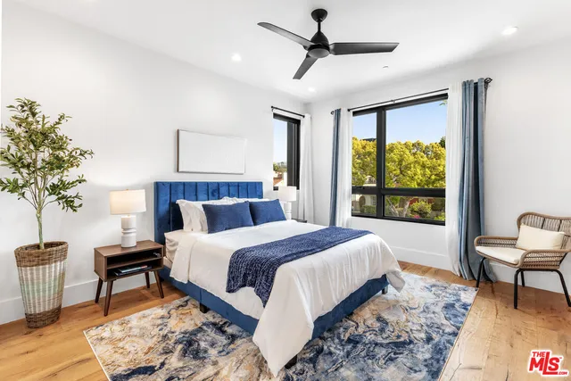 a view of a swimming pool with outdoor seating