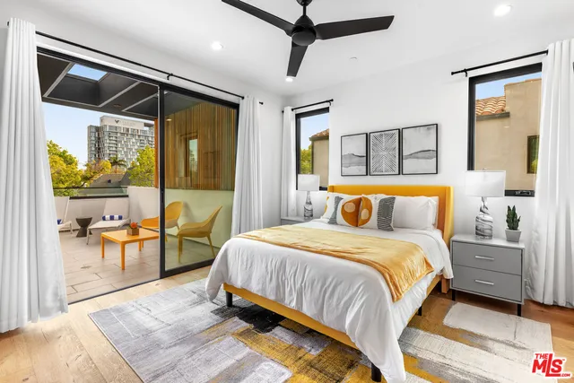 a bathroom with a double vanity sink mirror and shower