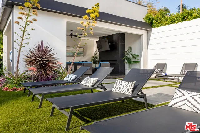 a view of a house with a swimming pool