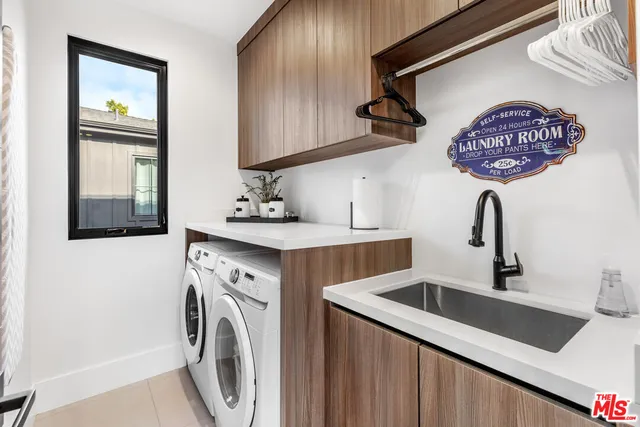 a bathroom with a sink a toilet and a bathtub