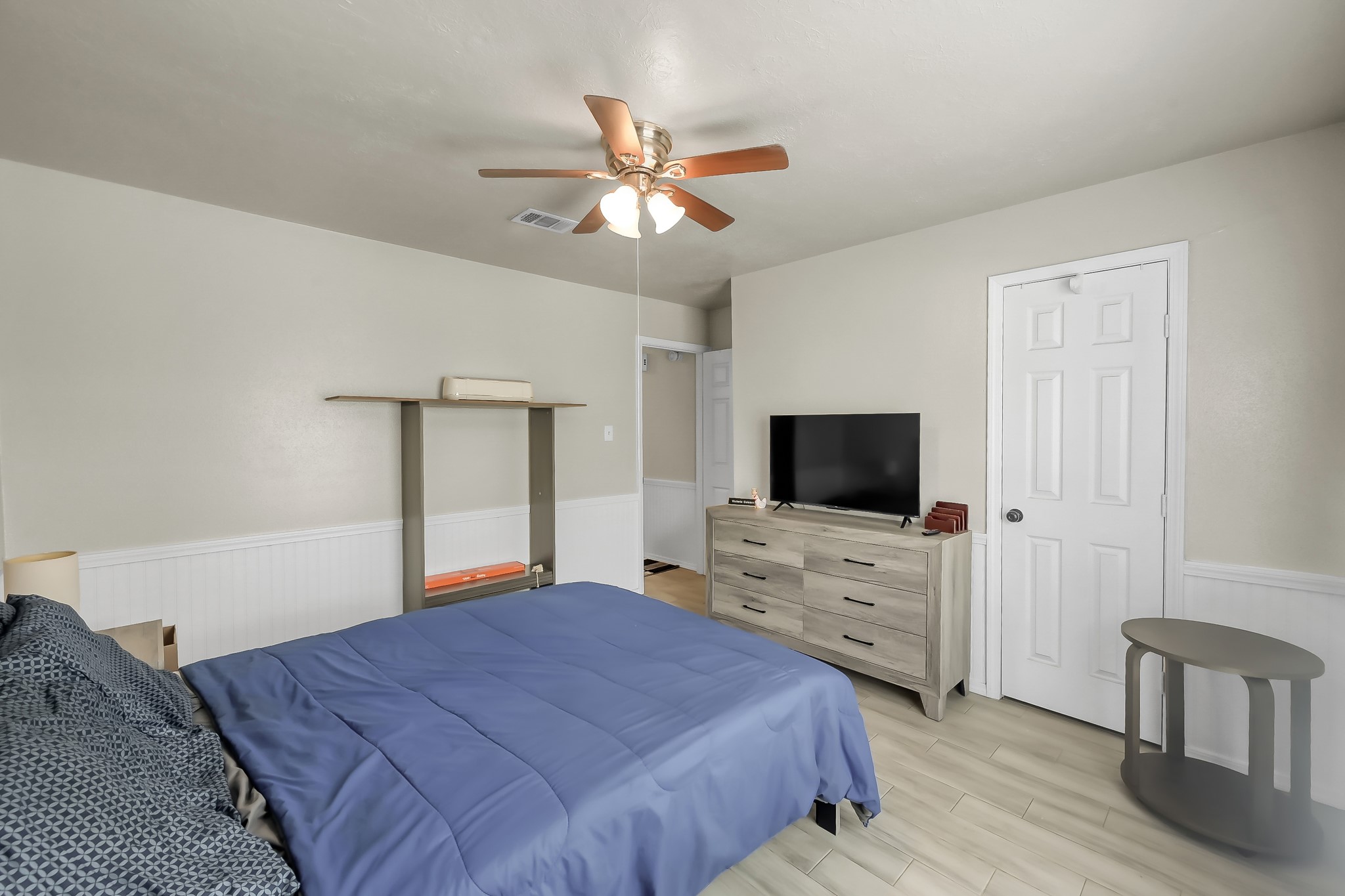 29206 Stapleford Street Spring, TX 77386 - Photo 12 of 22 a bedroom with a bed and a flat screen tv