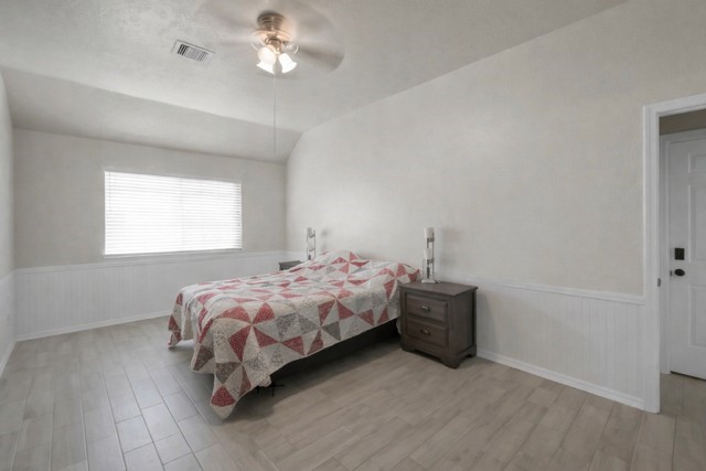 29206 Stapleford Street Spring, TX 77386 - Photo 15 of 22 a bedroom with a bed and window