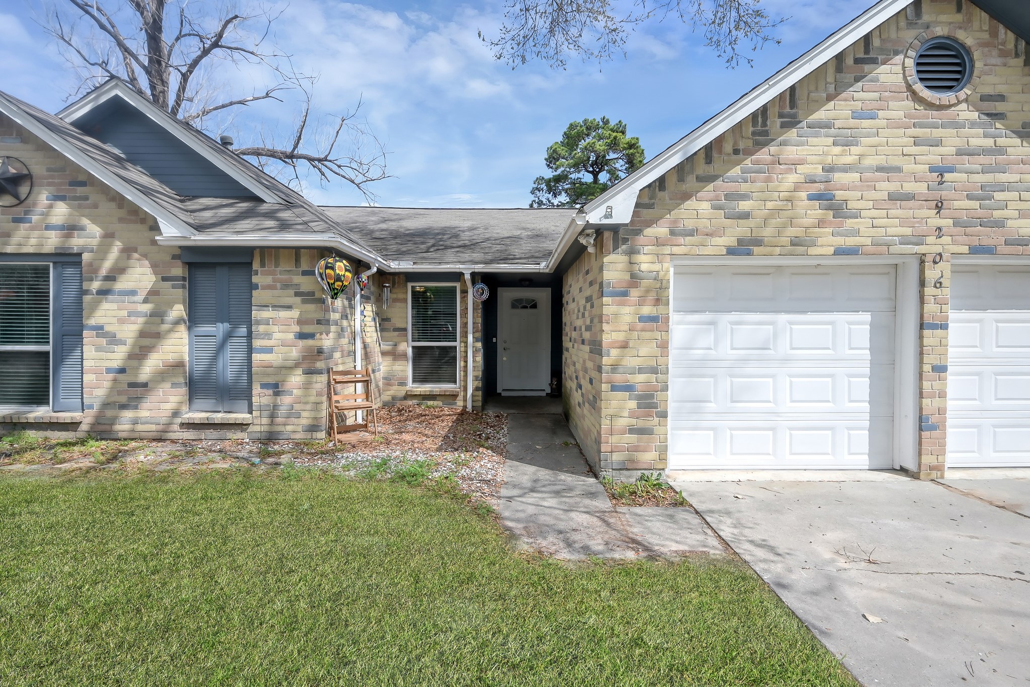 29206 Stapleford Street Spring, TX 77386 - Photo 2 of 22 a front view of a house with a yard