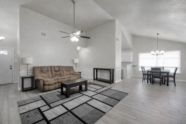 29206 Stapleford Street Spring, TX 77386 - Photo 6 of 22 a living room with furniture and a table