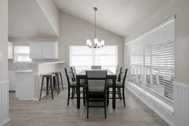 29206 Stapleford Street Spring, TX 77386 - Photo 7 of 22 a view of a dining room with furniture window and wooden floor