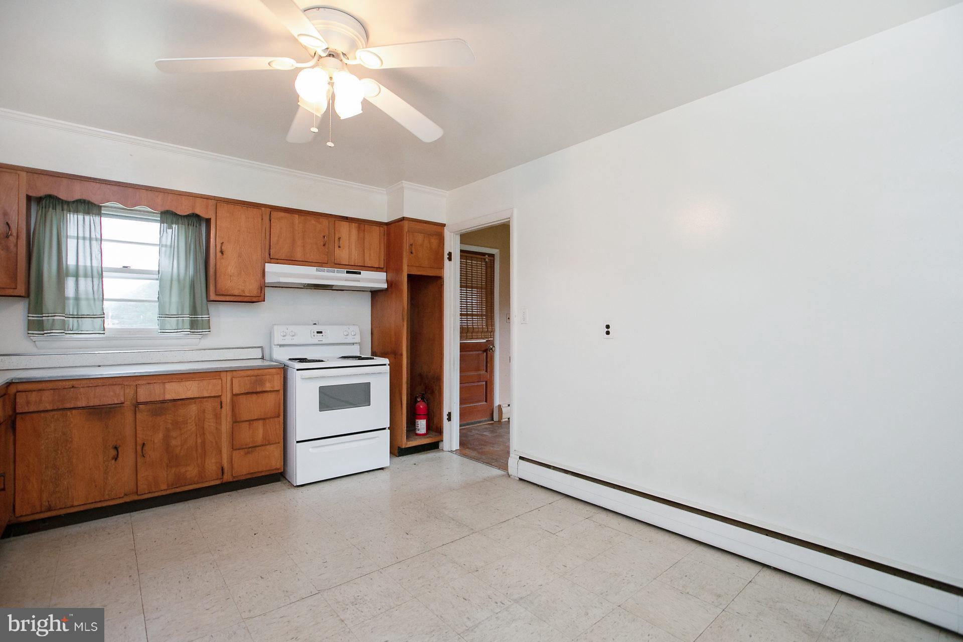 2815 Holland Cliffs Road Huntingtown, MD 20639 - Photo 20 of 21 Full country kitchen & ceiling fan.
