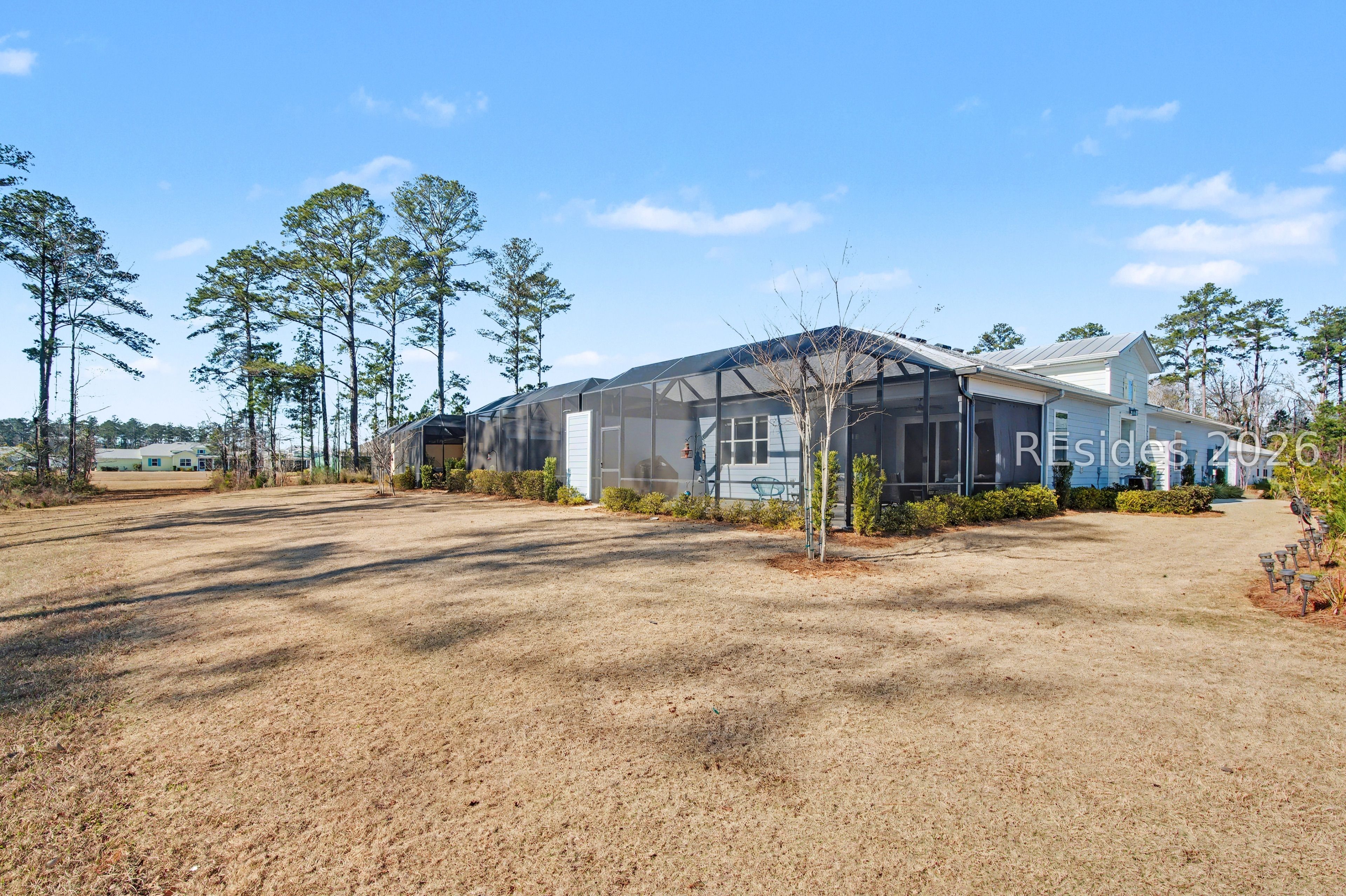 99 Salty Rim Point Hardeeville, SC 29927 - Photo 26 of 50 Largest green space behind the house.