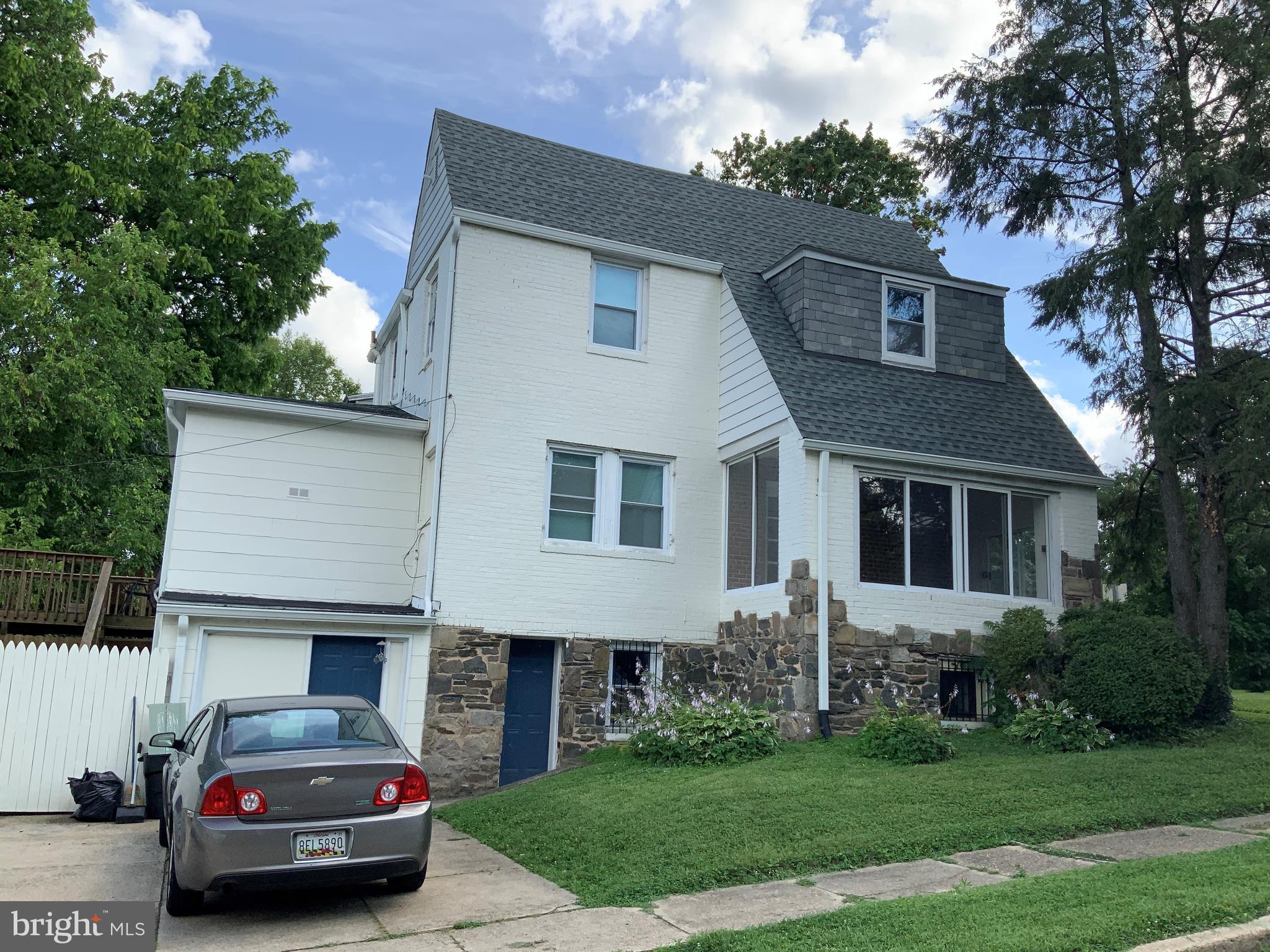 6209 York Road, Unit A Baltimore, MD 21212 - Photo 30 of 31 a car parked in front of a house