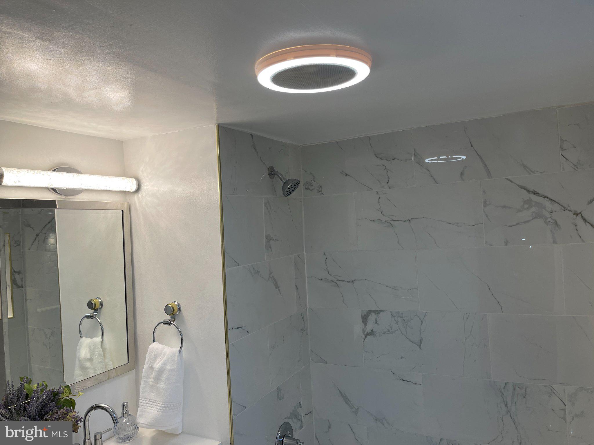 3712 West Cold Spring Lane Baltimore, MD 21215 - Photo 11 of 39 Sleek bathroom with modern lighting.