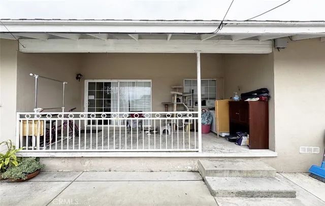 a black and white photo of a balcony