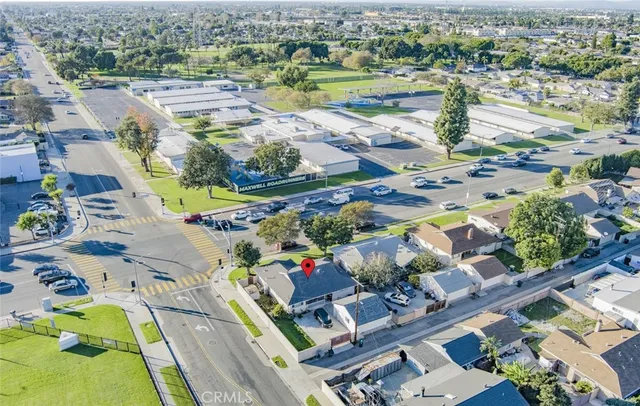 an aerial view of lake residential house with swimming pool and ocean view