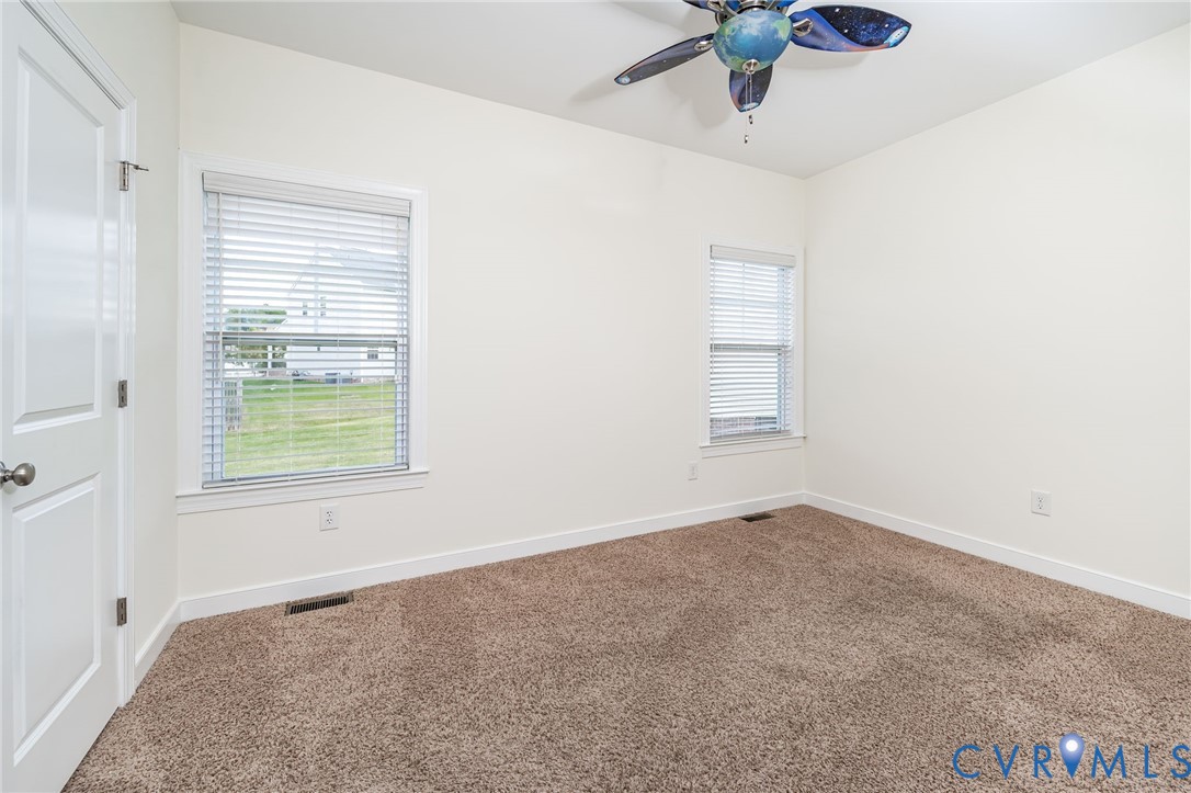 11224 Hill Ridge Court Ashland, VA 23005 - Photo 20 of 35 a view of an empty room with a window