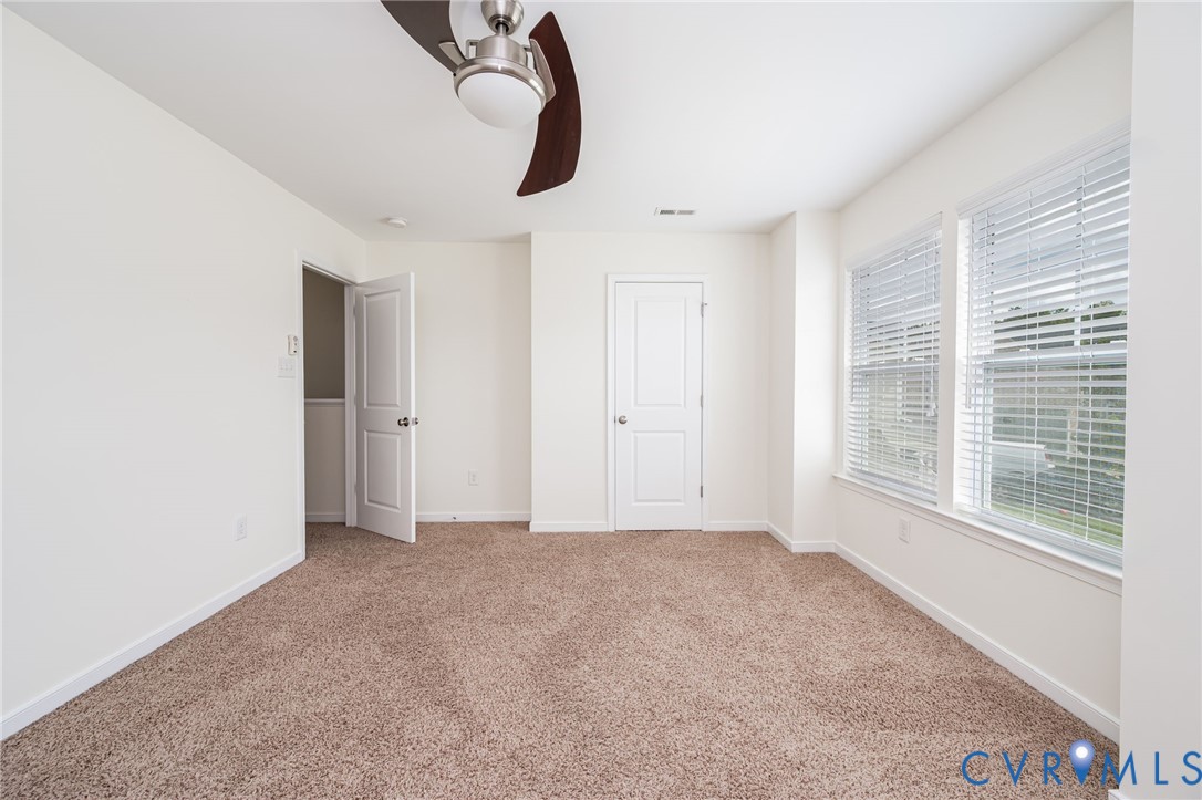 11224 Hill Ridge Court Ashland, VA 23005 - Photo 21 of 35 a view of an empty room with a window