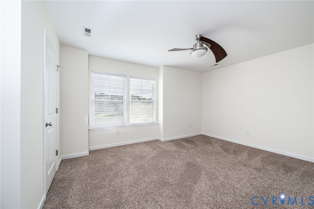 11224 Hill Ridge Court Ashland, VA 23005 - Photo 22 of 35 a view of an empty room with windows