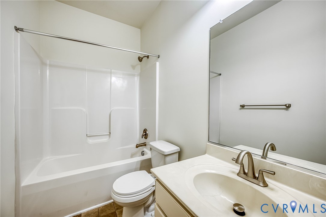 11224 Hill Ridge Court Ashland, VA 23005 - Photo 26 of 35 a bathroom with a sink toilet and shower