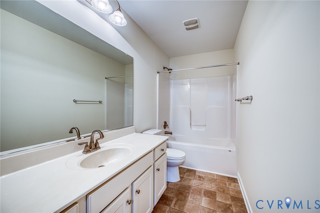 11224 Hill Ridge Court Ashland, VA 23005 - Photo 29 of 35 a bathroom with a sink and a mirror