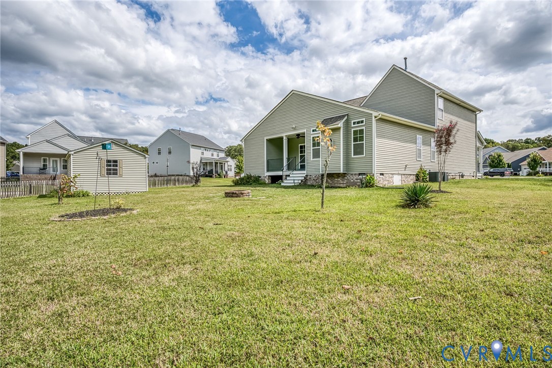 11224 Hill Ridge Court Ashland, VA 23005 - Photo 31 of 35 a front view of house with yard and green space
