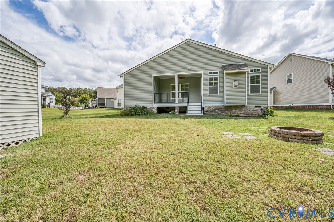 11224 Hill Ridge Court Ashland, VA 23005 - Photo 32 of 35 a view of a house with a yard and sitting area