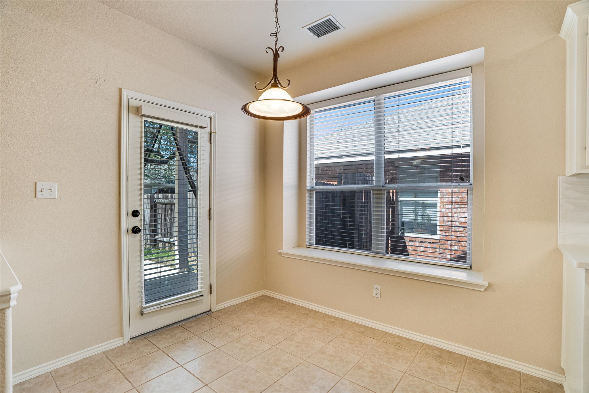 2207 Clover Ridge Drive Cedar Park, TX 78613 - Photo 9 of 25 Breakfast area off the kitchen with door to patio