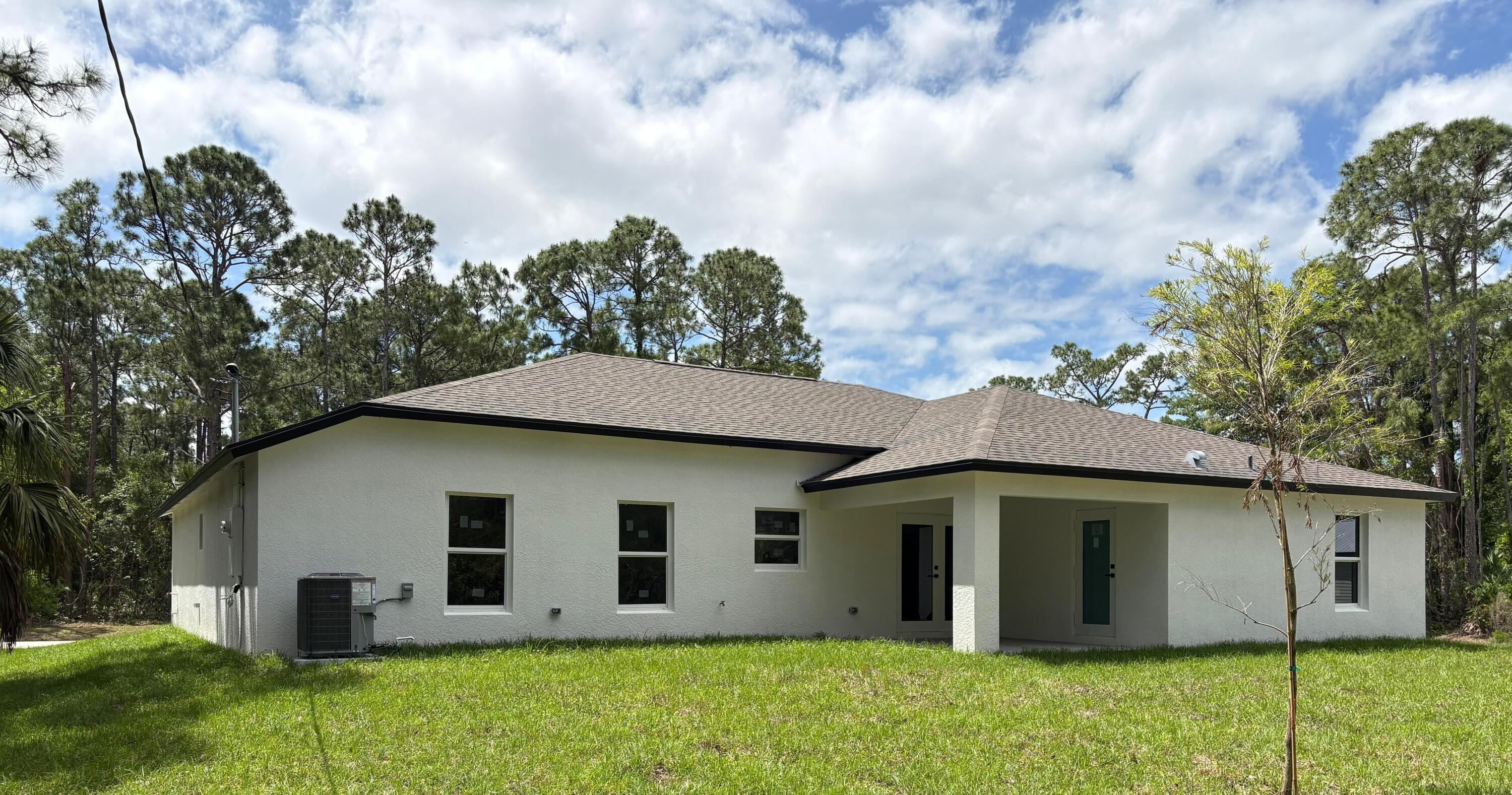 471 Saul Road Southwest Palm Bay, FL 32908 - Photo 2 of 9 saul outside back