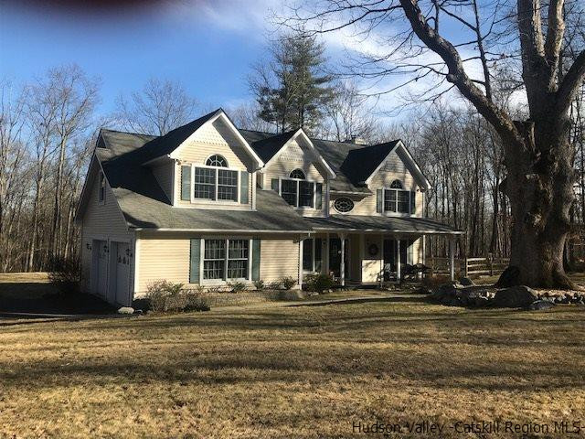 94 South Mountain Road Wallkill, NY 12589 - Photo 1 of 35 a front view of a house with a yard
