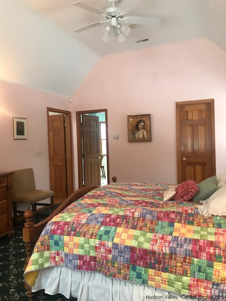 94 South Mountain Road Wallkill, NY 12589 - Photo 21 of 35 a bedroom with a bed and a dresser with mirror