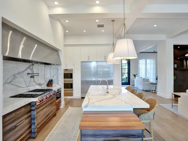 a bedroom with furniture and a flat screen tv