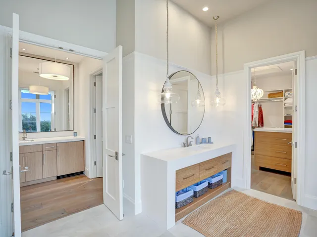 a kitchen with a sink and a stove top oven