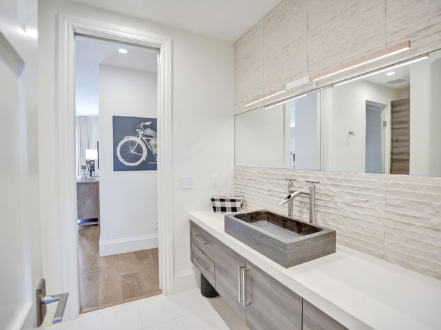 an aerial view of a city with ocean view